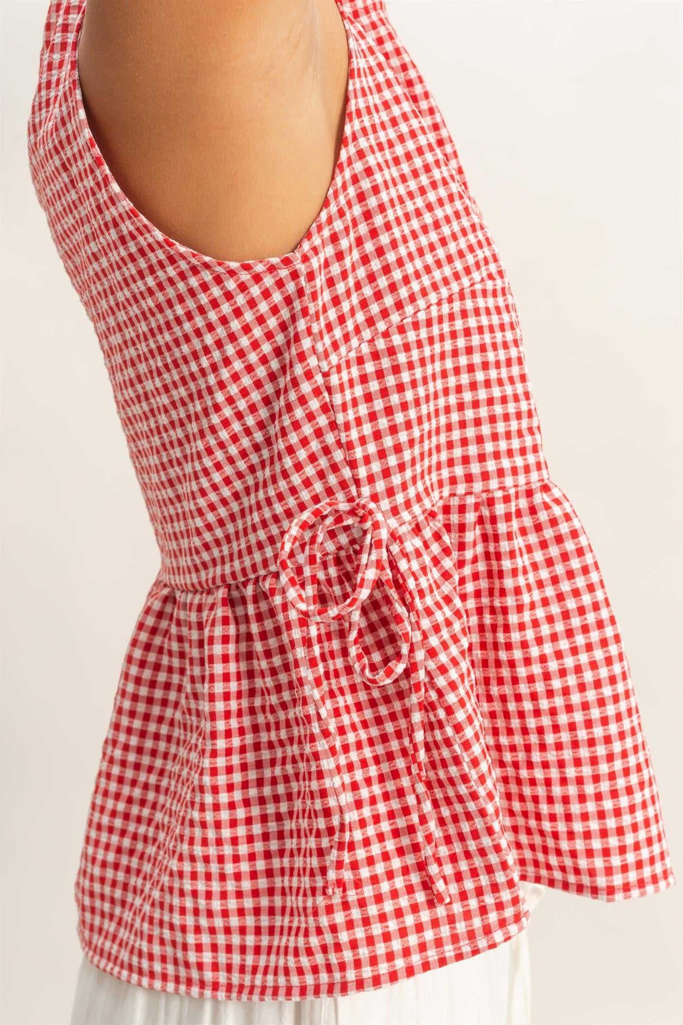 Gingham Sleeveless Peplum Top With Side Ties