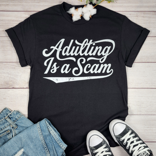 Adulting Is A Scam Tee