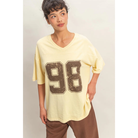 Oversized Varsity Style V-Neck Graphic T-Shirt