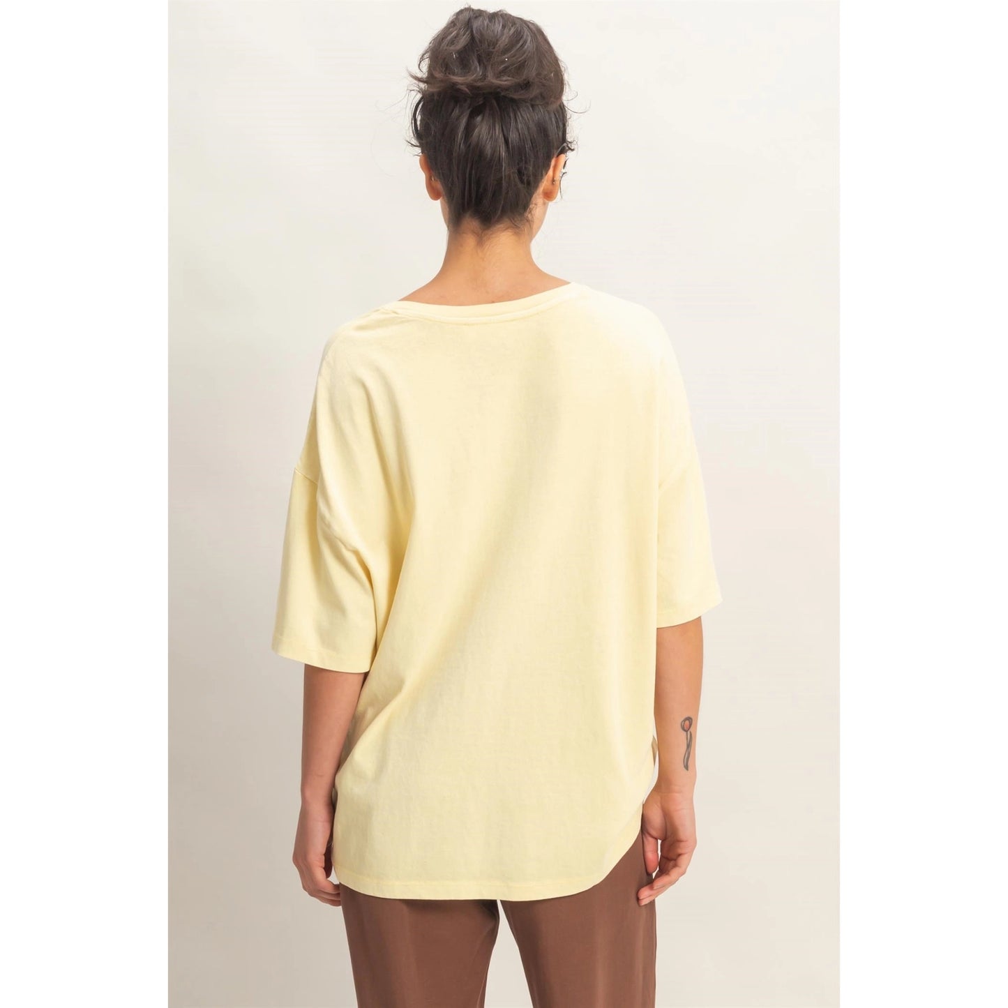 Oversized Varsity Style V-Neck Graphic T-Shirt