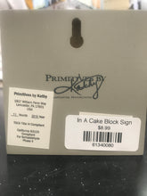In A Cake Block Sign